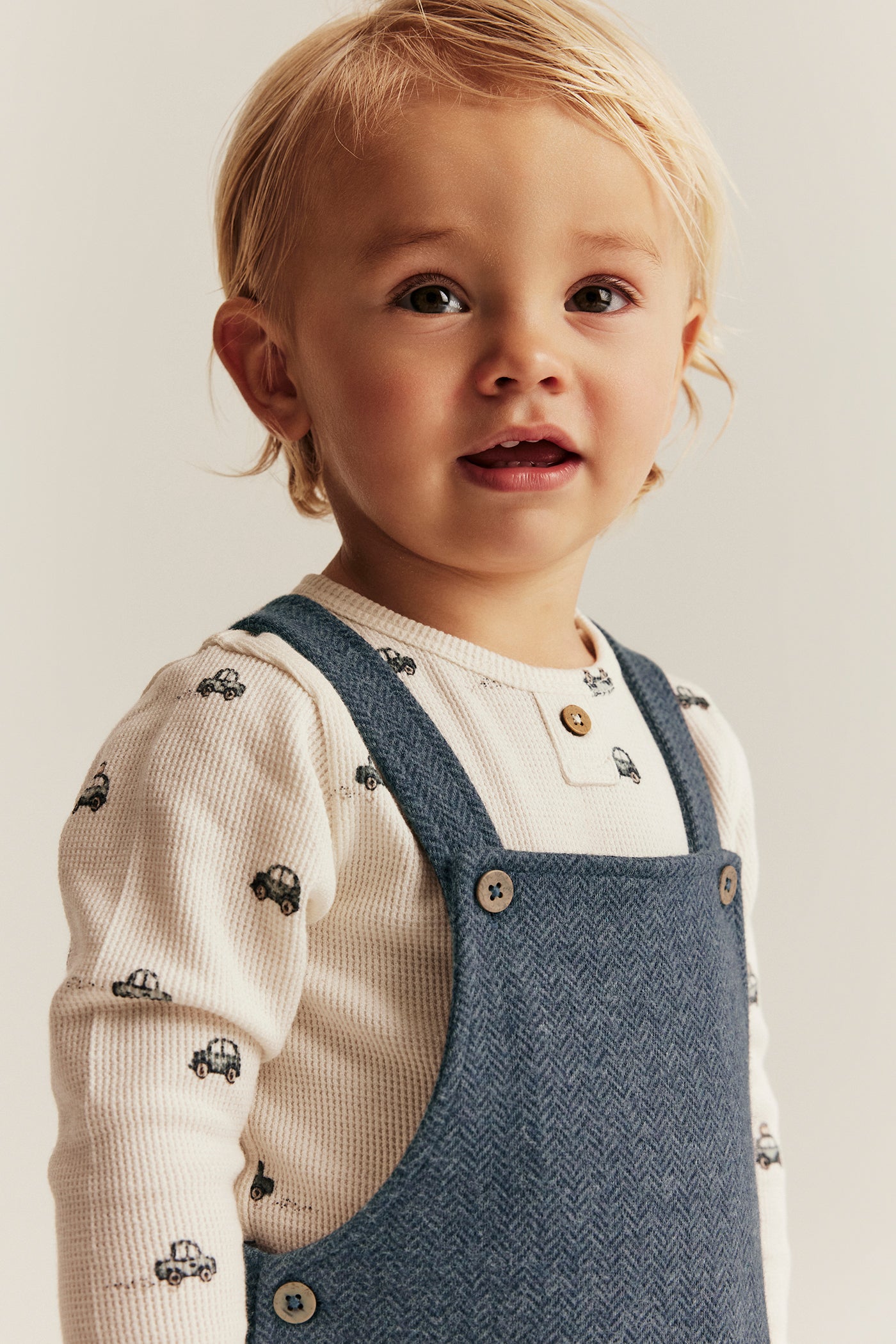 Baby blue dungarees in herringbone