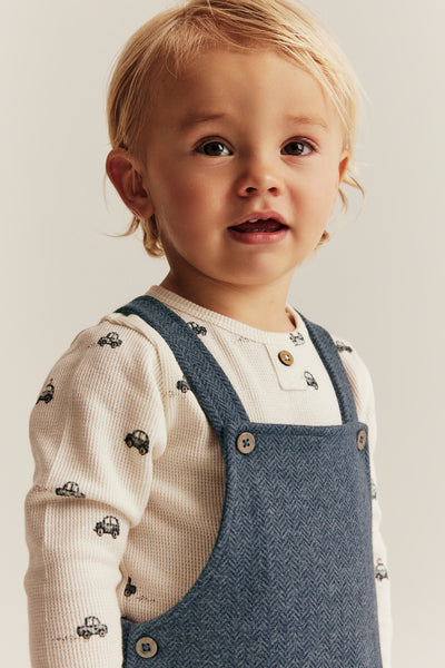 Baby blue dungarees in herringbone