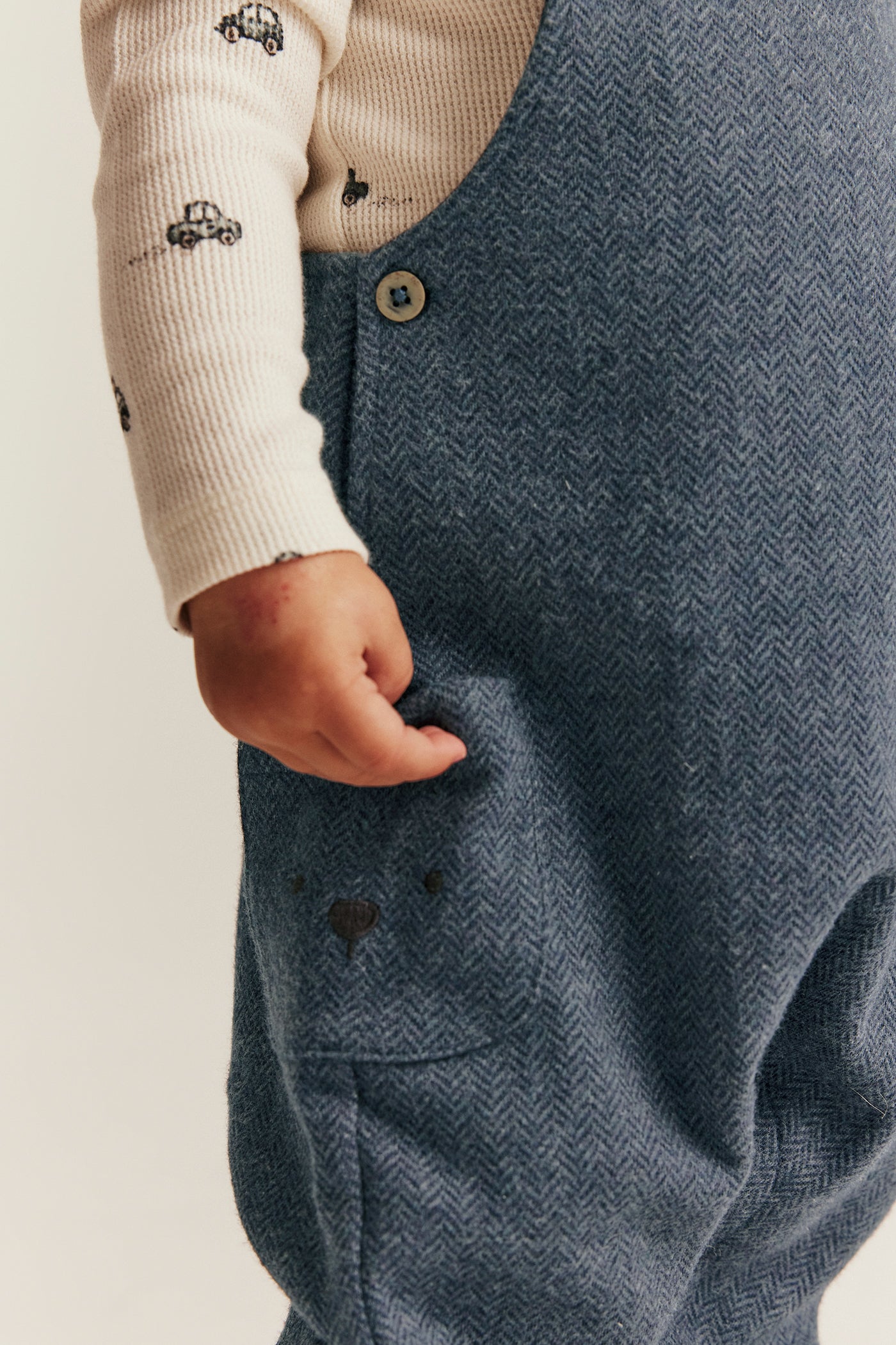Baby blue dungarees in herringbone