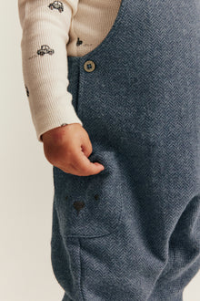 Baby blue dungarees in herringbone