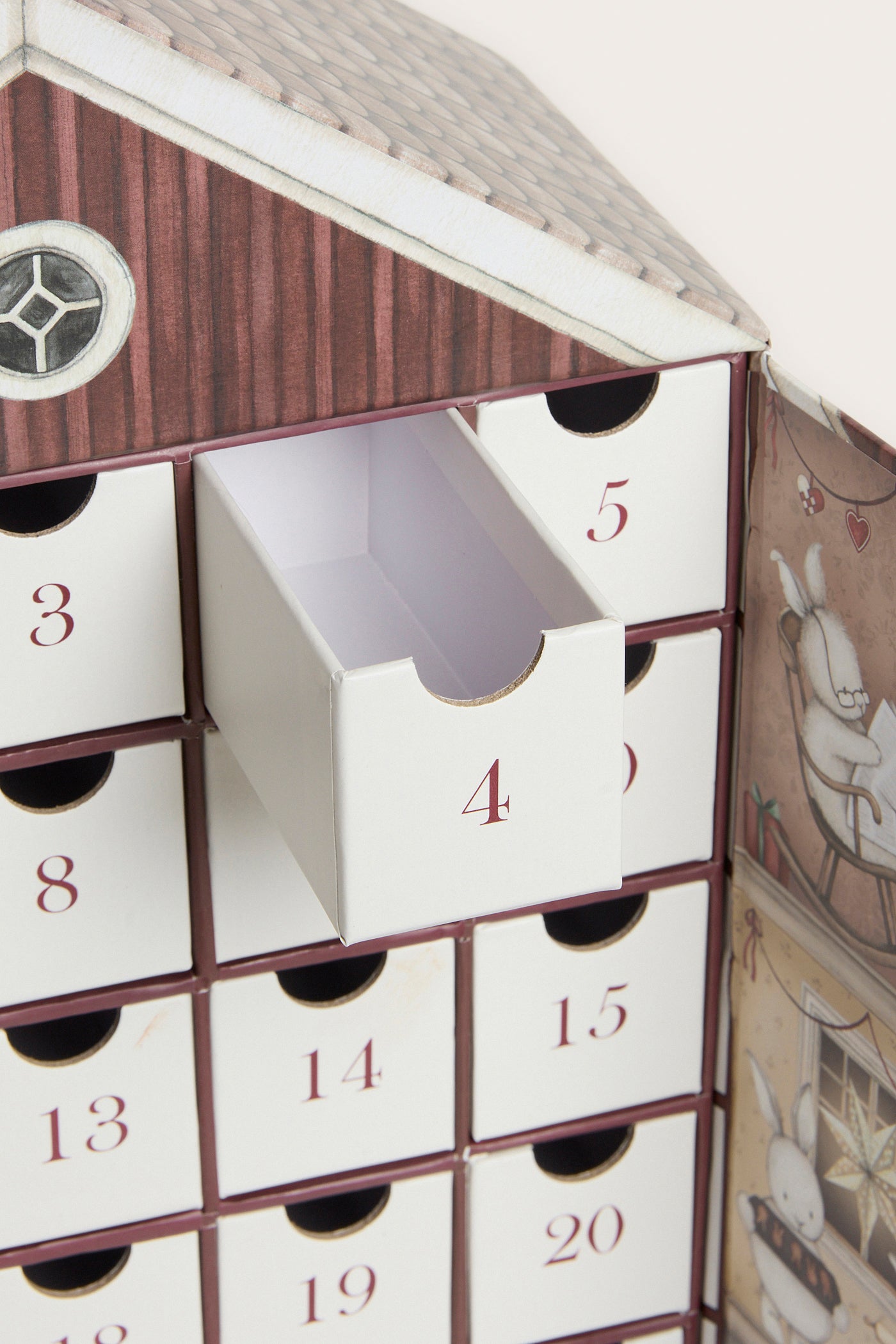 Baby and kids' red Advent calendar house