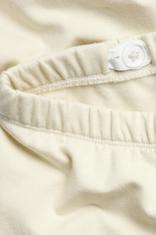 Kids’ beige leggings with brushed inside