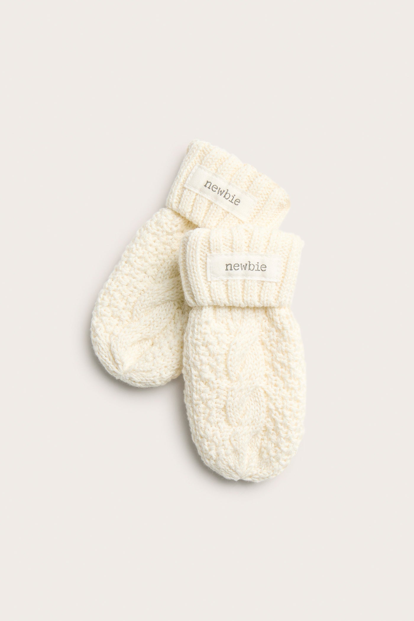 Baby white cable-knit mittens