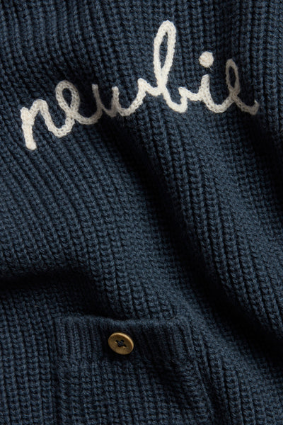 Baby blue knitted jumper with Newbie logo