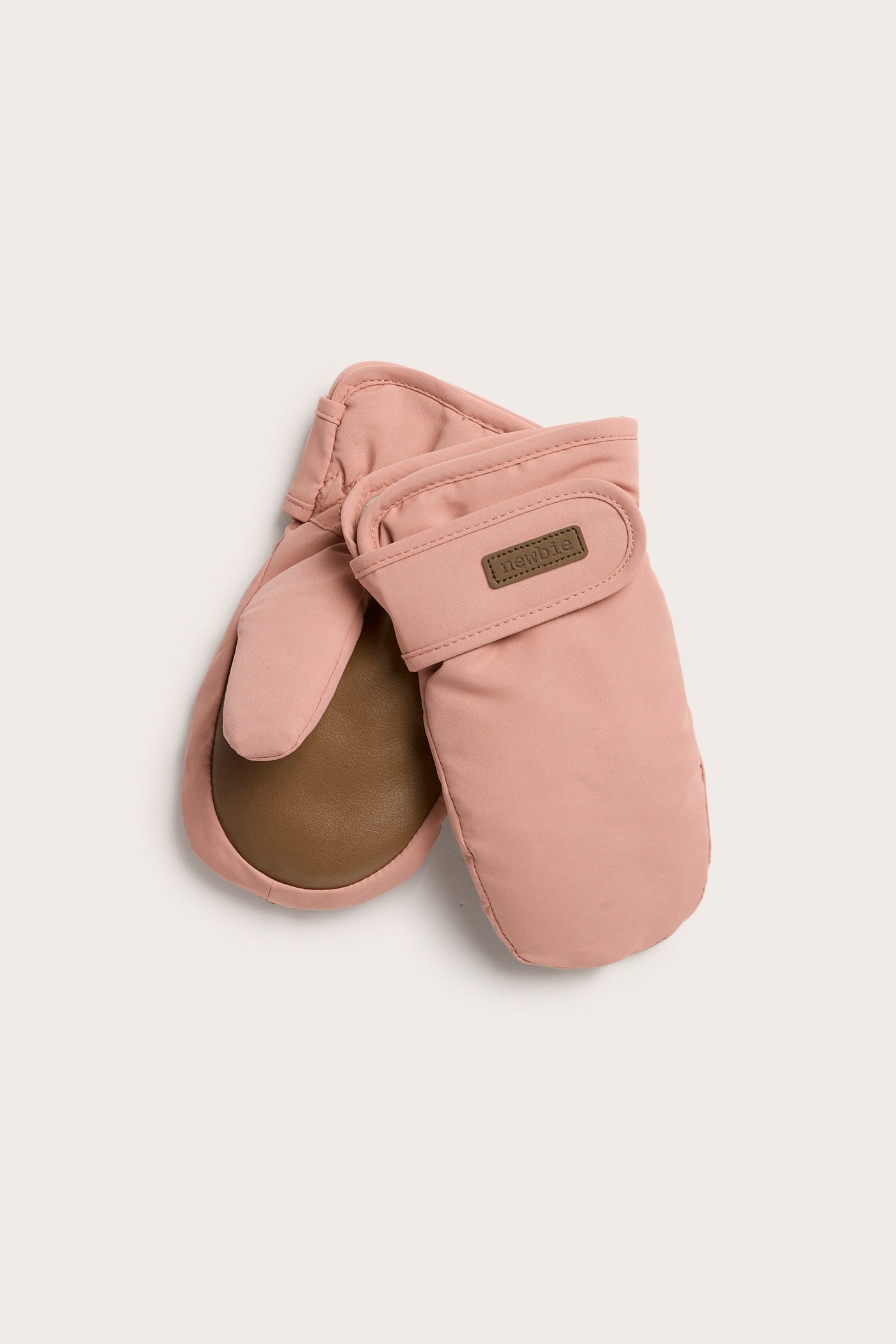 Kids’ pink water-repellent mittens