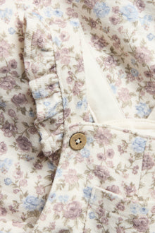 Baby white floral dungarees with frills