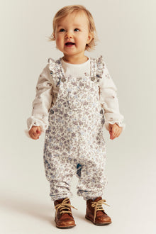 Baby white floral dungarees with frills