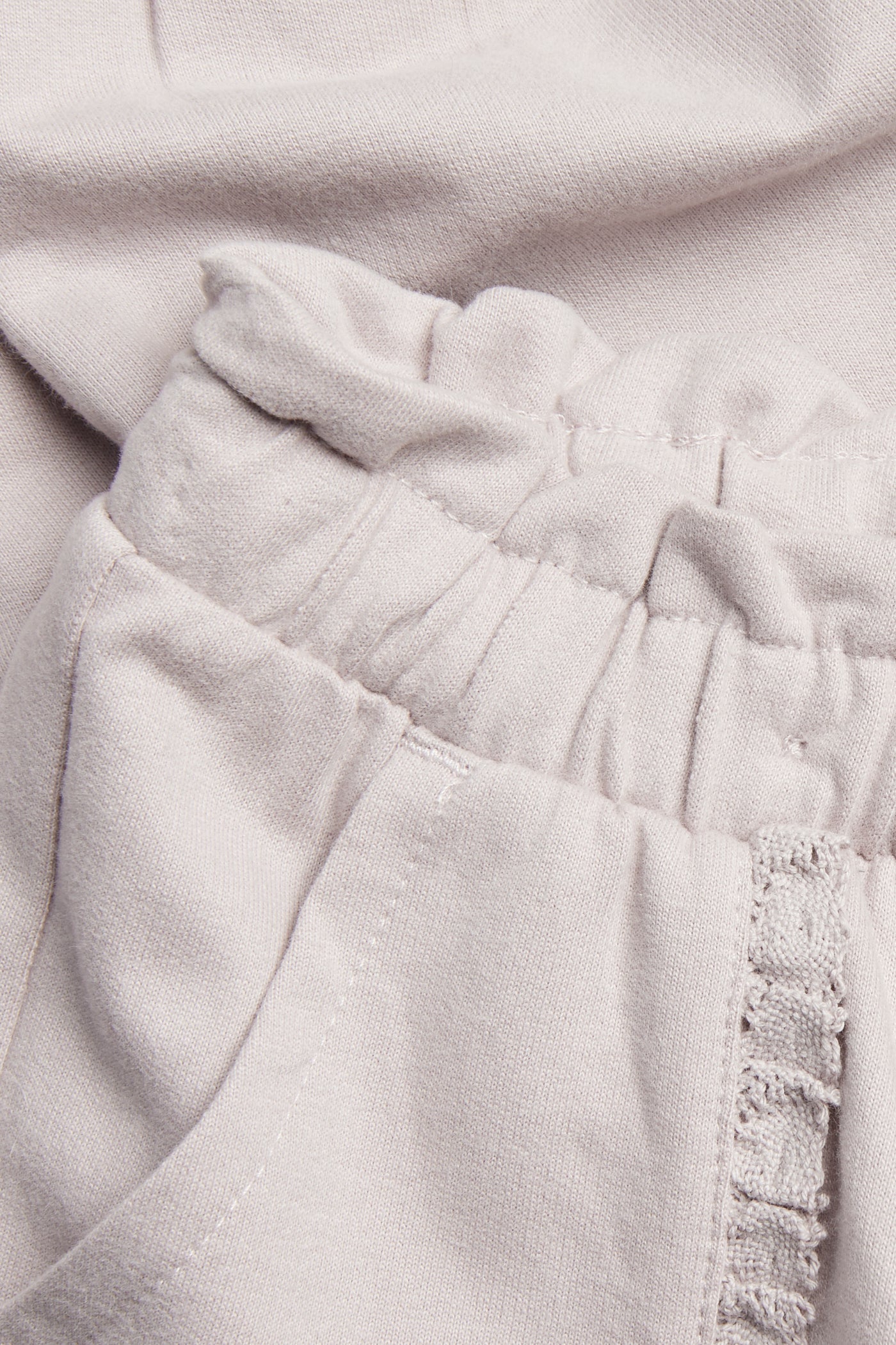 Kids purple joggers with lace details