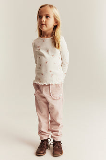 Kids’ pink joggers with lace details
