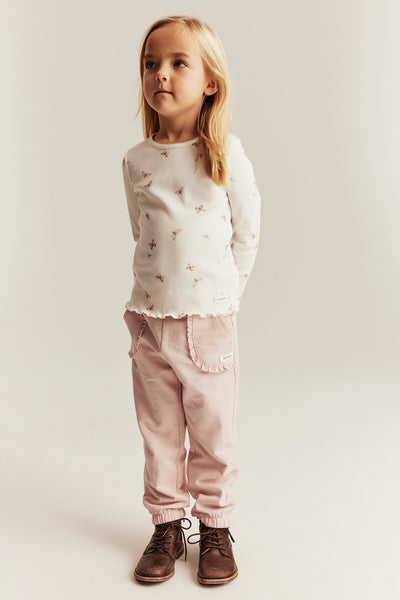 Kids’ pink joggers with lace details