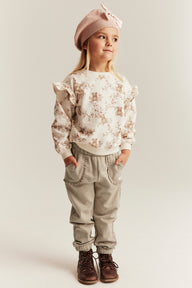 Kids’ beige joggers with lace details