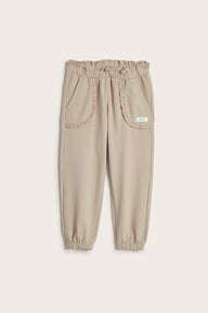 Kids’ beige joggers with lace details