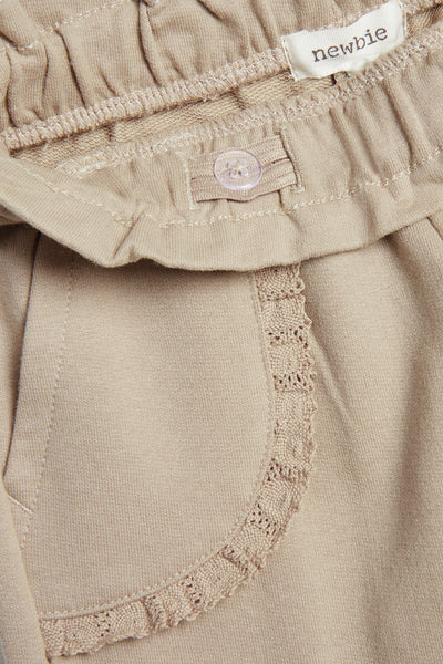 Baby beige joggers with lace details