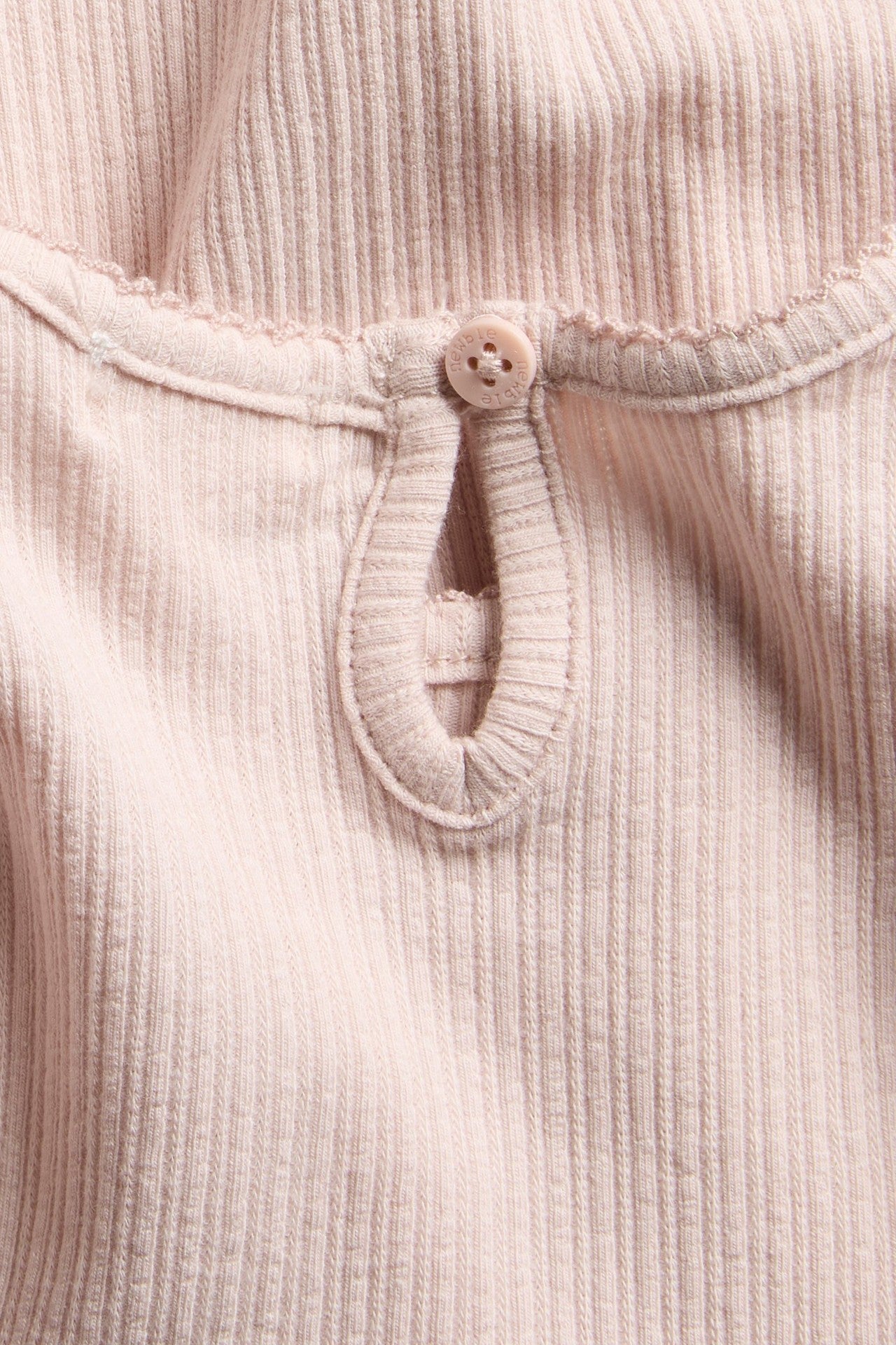 Baby pink bodysuit with short puff sleeves