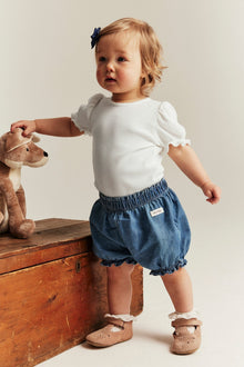 Baby white bodysuit with puff sleeves