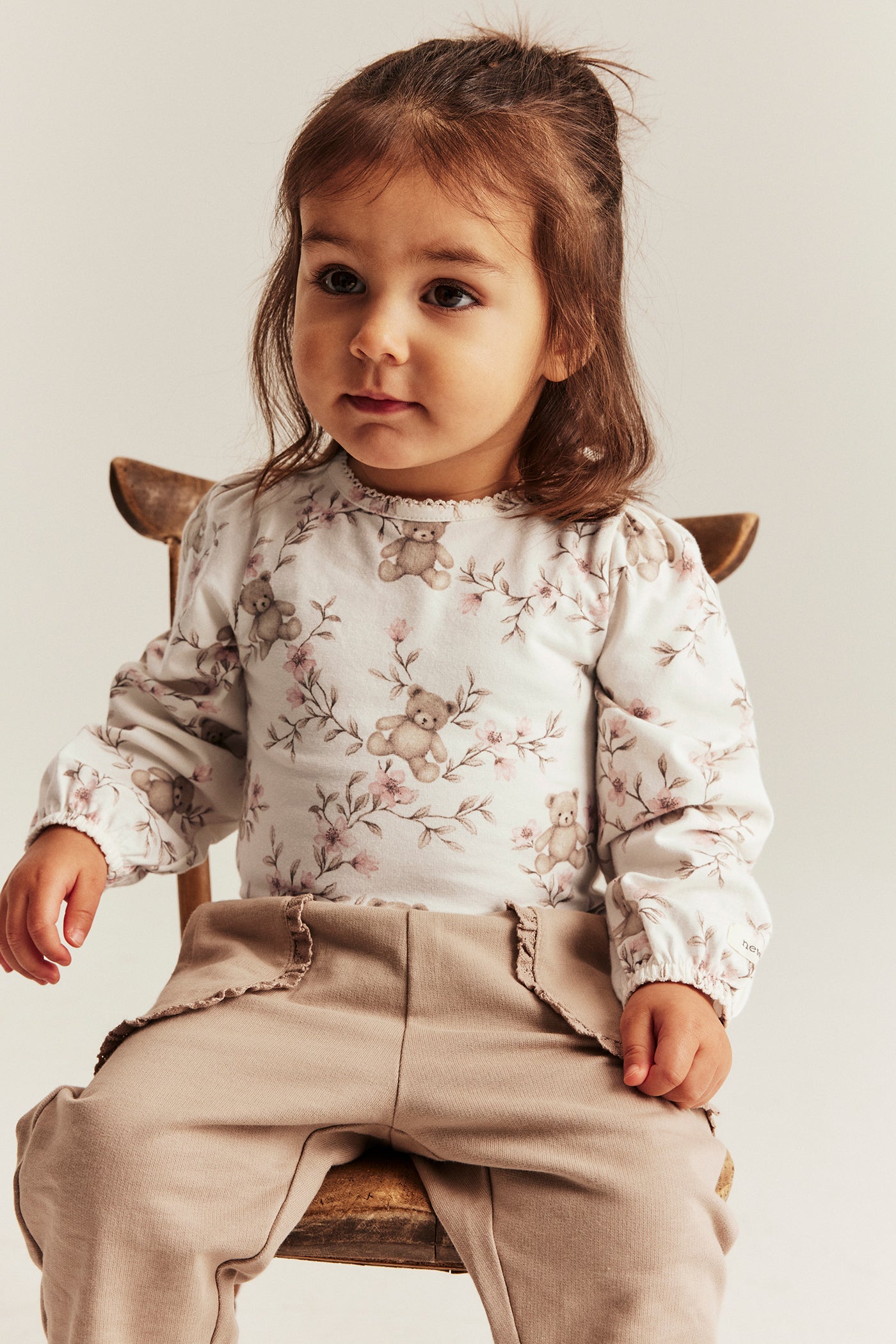 Baby beige floral bodysuit with teddy bears