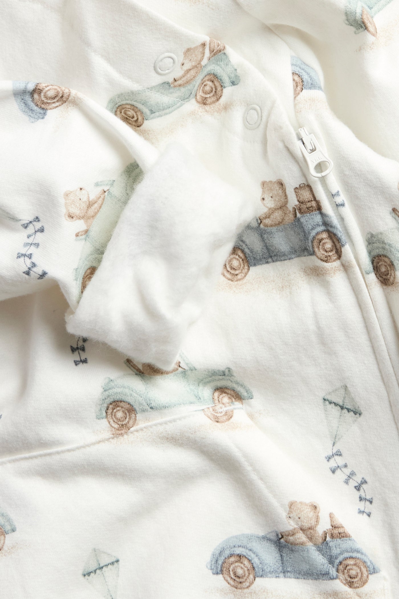 Baby white jumpsuit with car motif