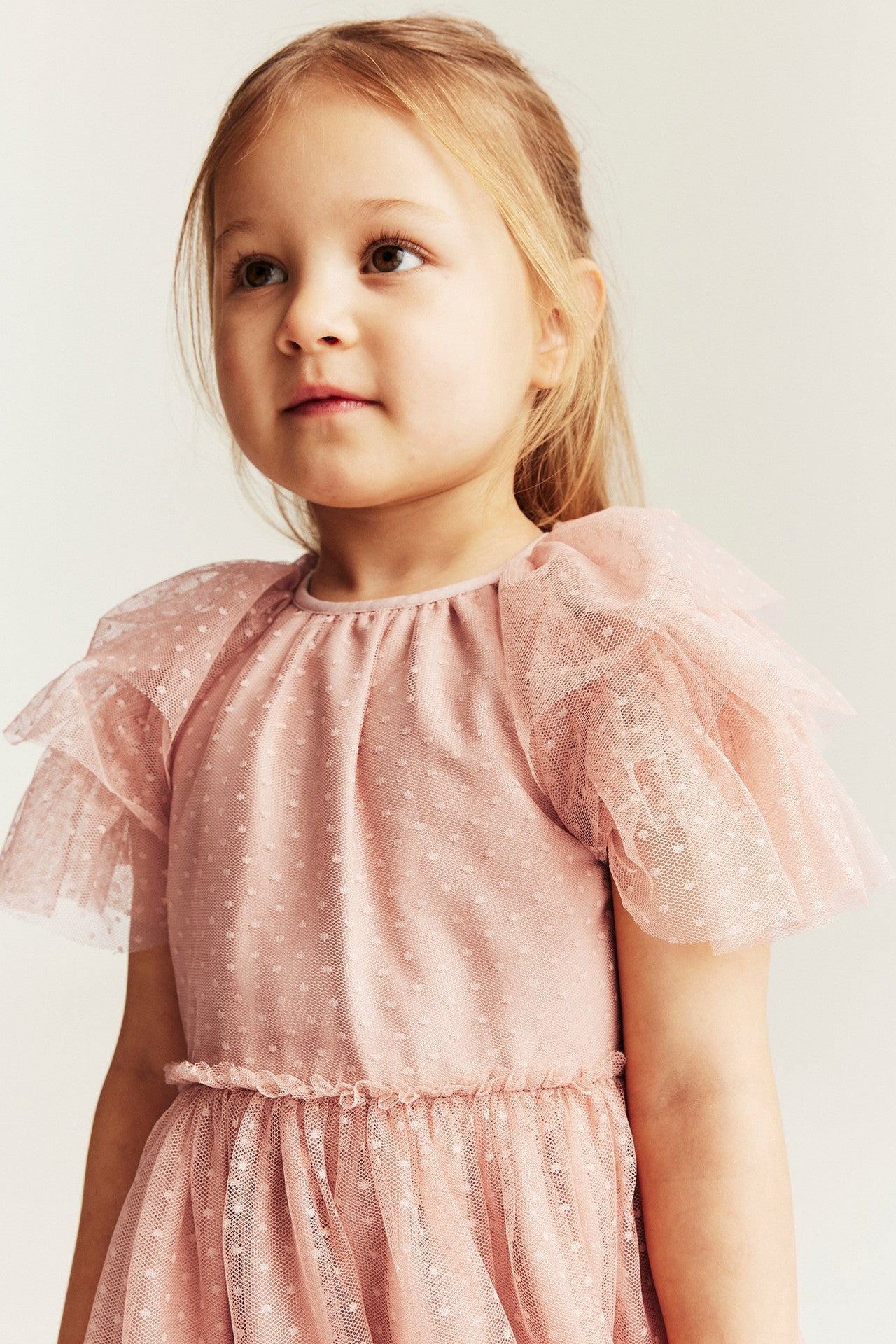 Kids pink mesh dress with ruffles