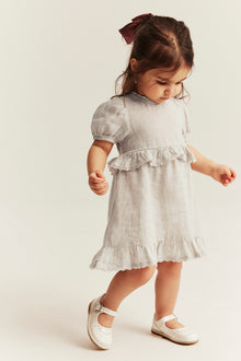 Baby frilled linen dress
