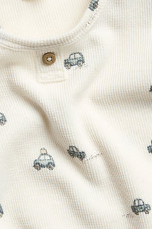 Baby white bodysuit with car motif