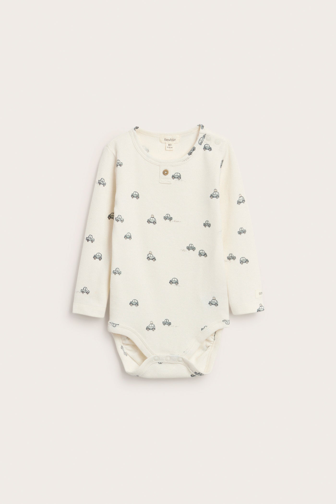 Baby white bodysuit with car motif