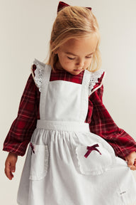 Kids´ white apron with frill and bow