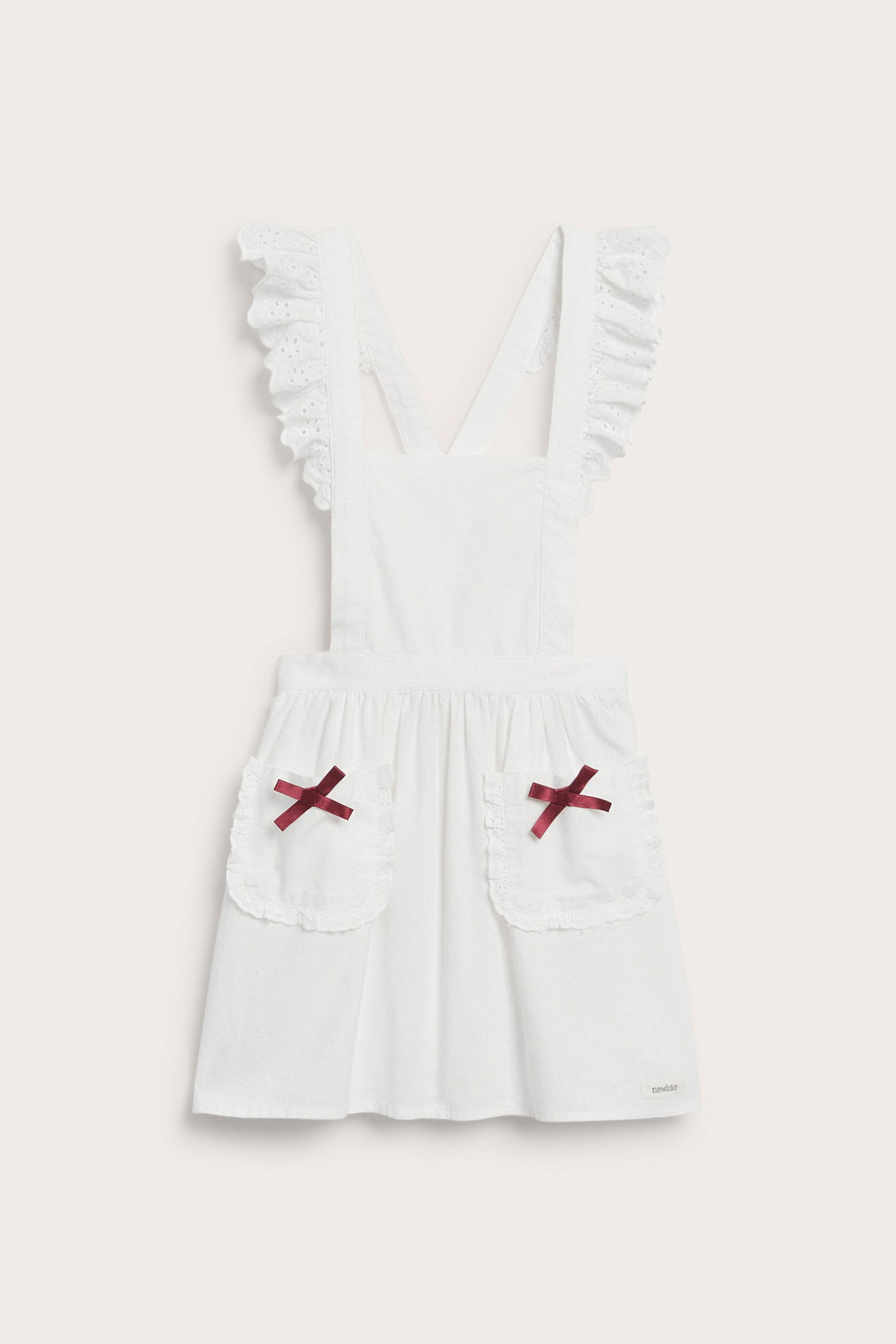 Kids´ white apron with frill and bow