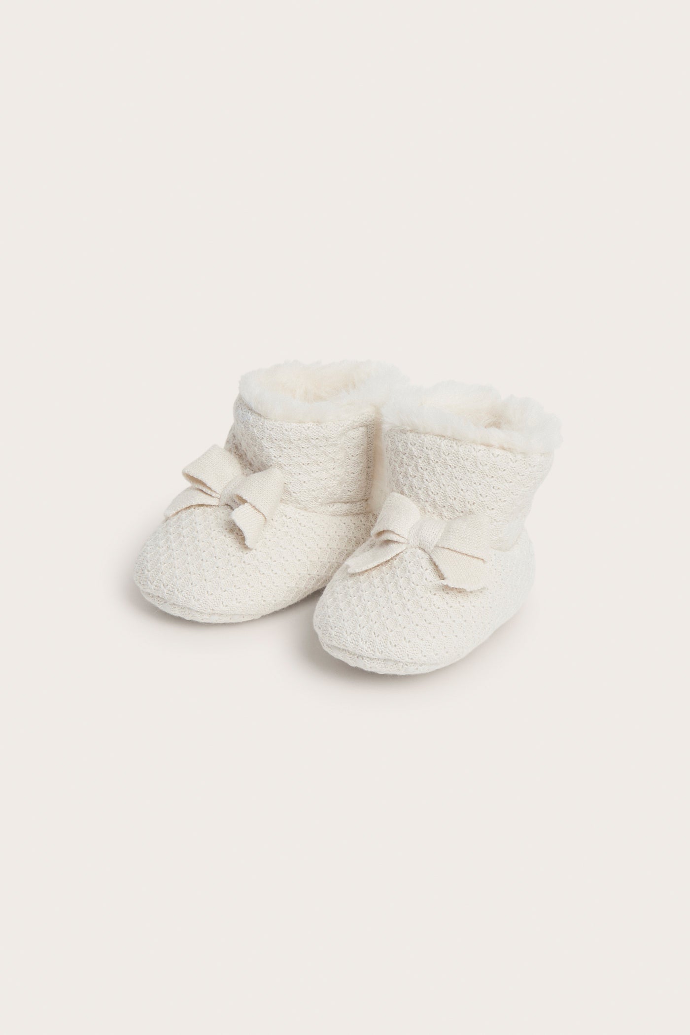 Baby white booties with bows