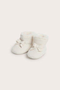 Baby white booties with bows