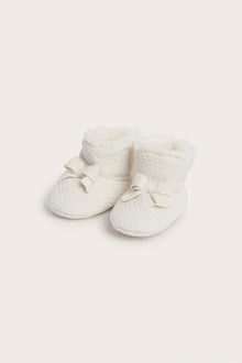Baby white booties with bows