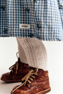 Baby blue checked dress with blueberries