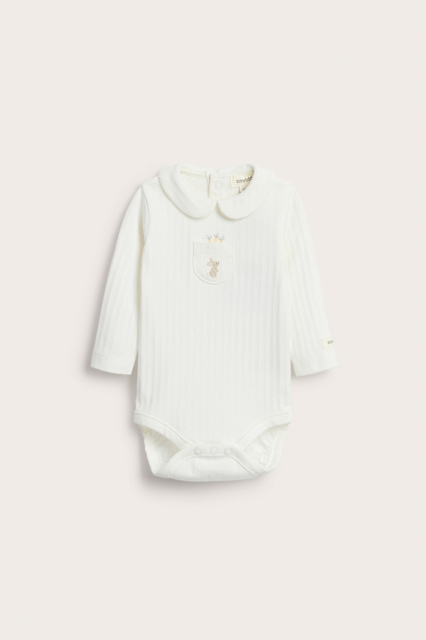 Baby white long-sleeved bodysuit with a collar