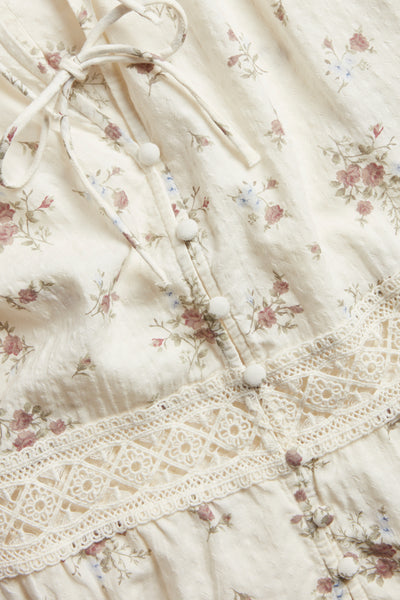 Women's white floral three-quarter sleeve blouse