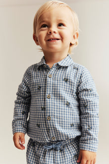 Baby blue shirt bodysuit with blueberries