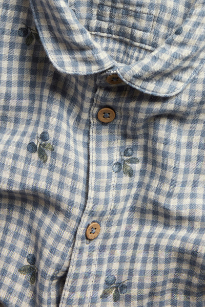 Baby blue shirt bodysuit with blueberries