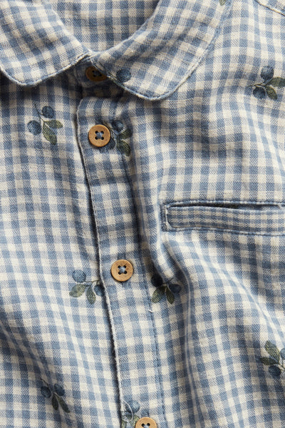 Kids’ blue checked shirt with blueberries