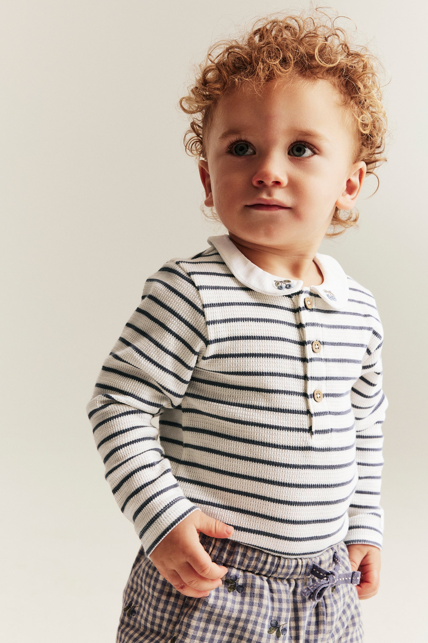 Baby white striped bodysuit with collar