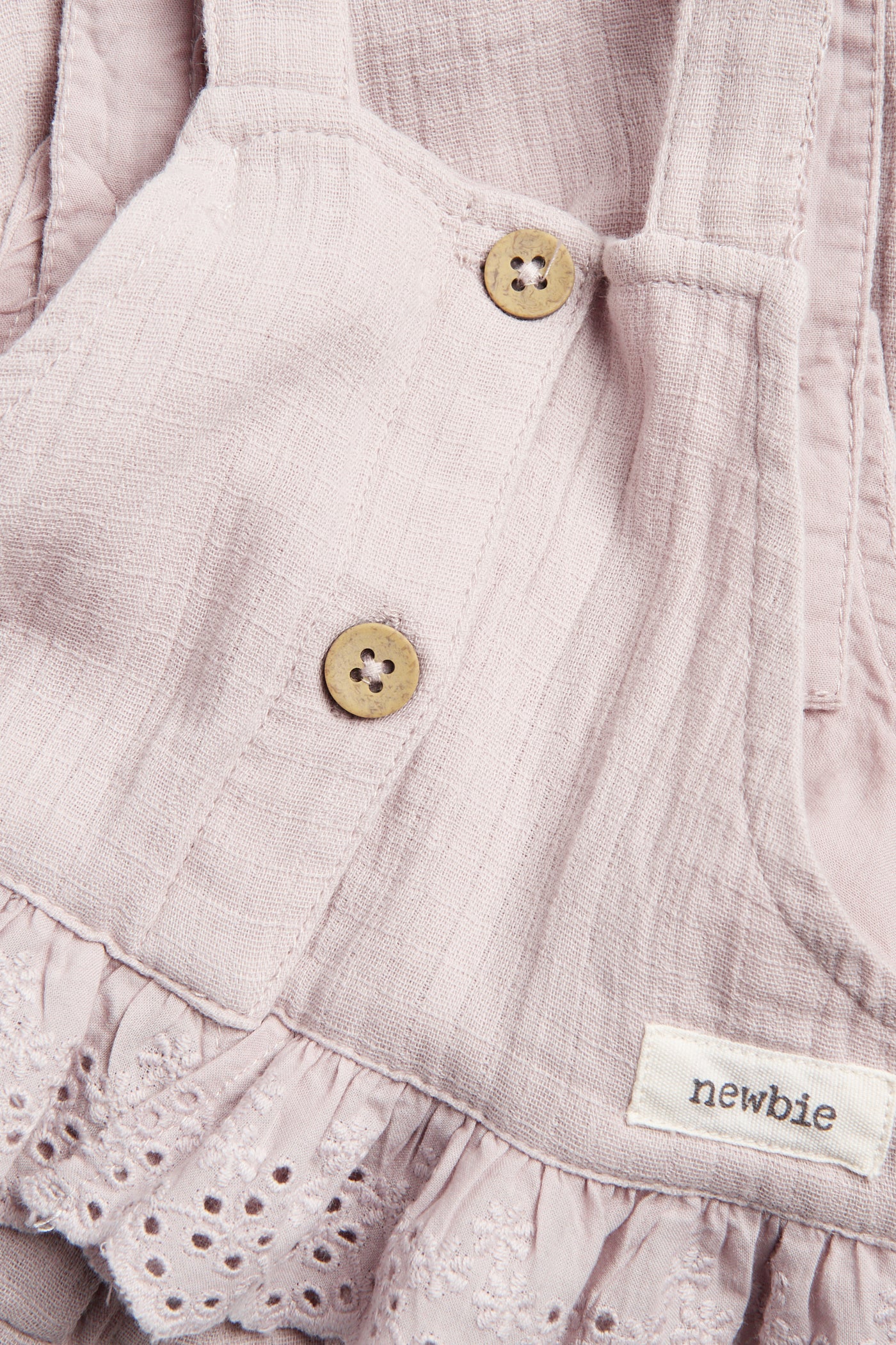 Baby purple dungarees with lace frill