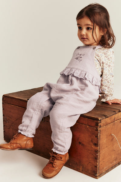 Baby purple dungarees with lace frill