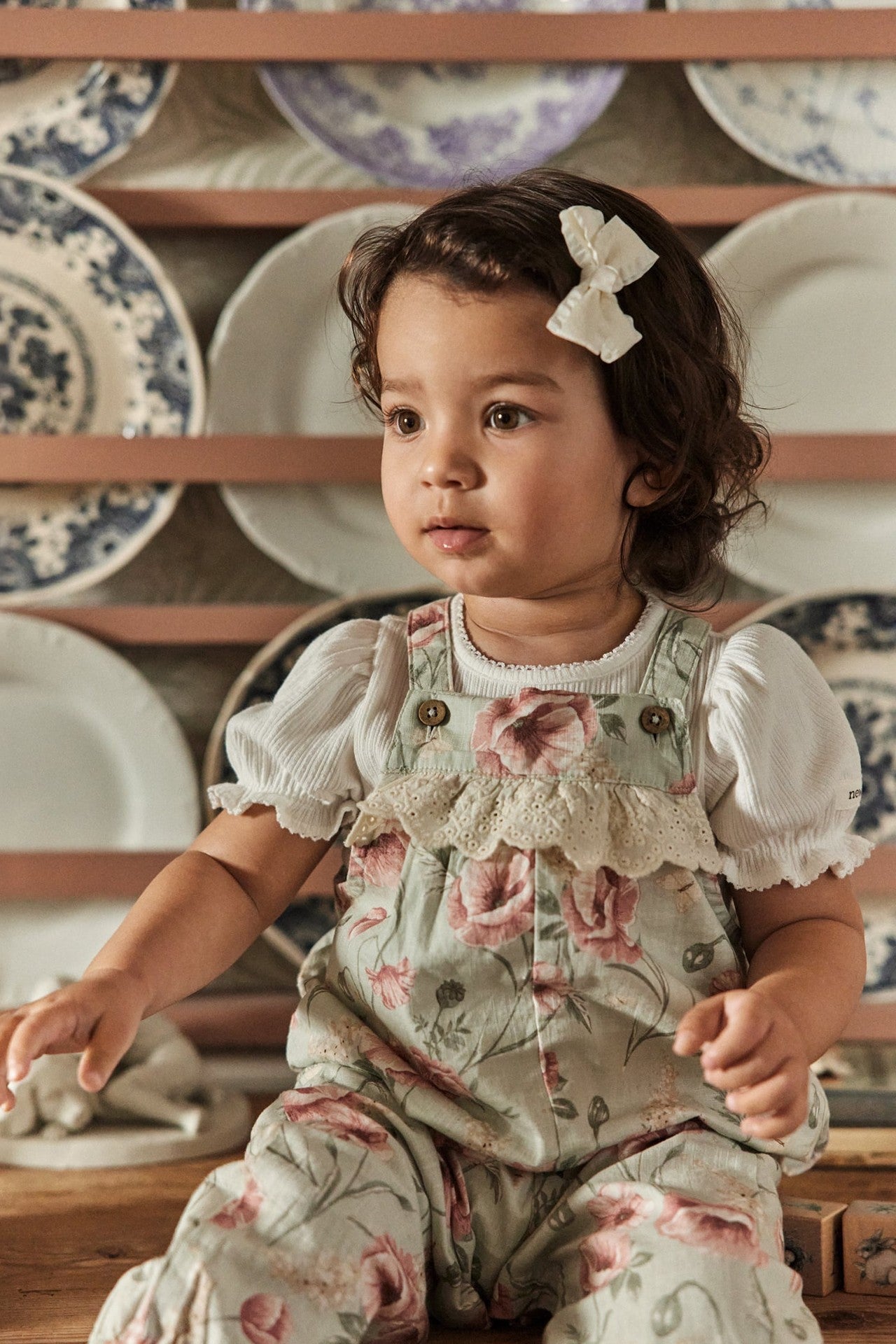 Baby green floral dungarees