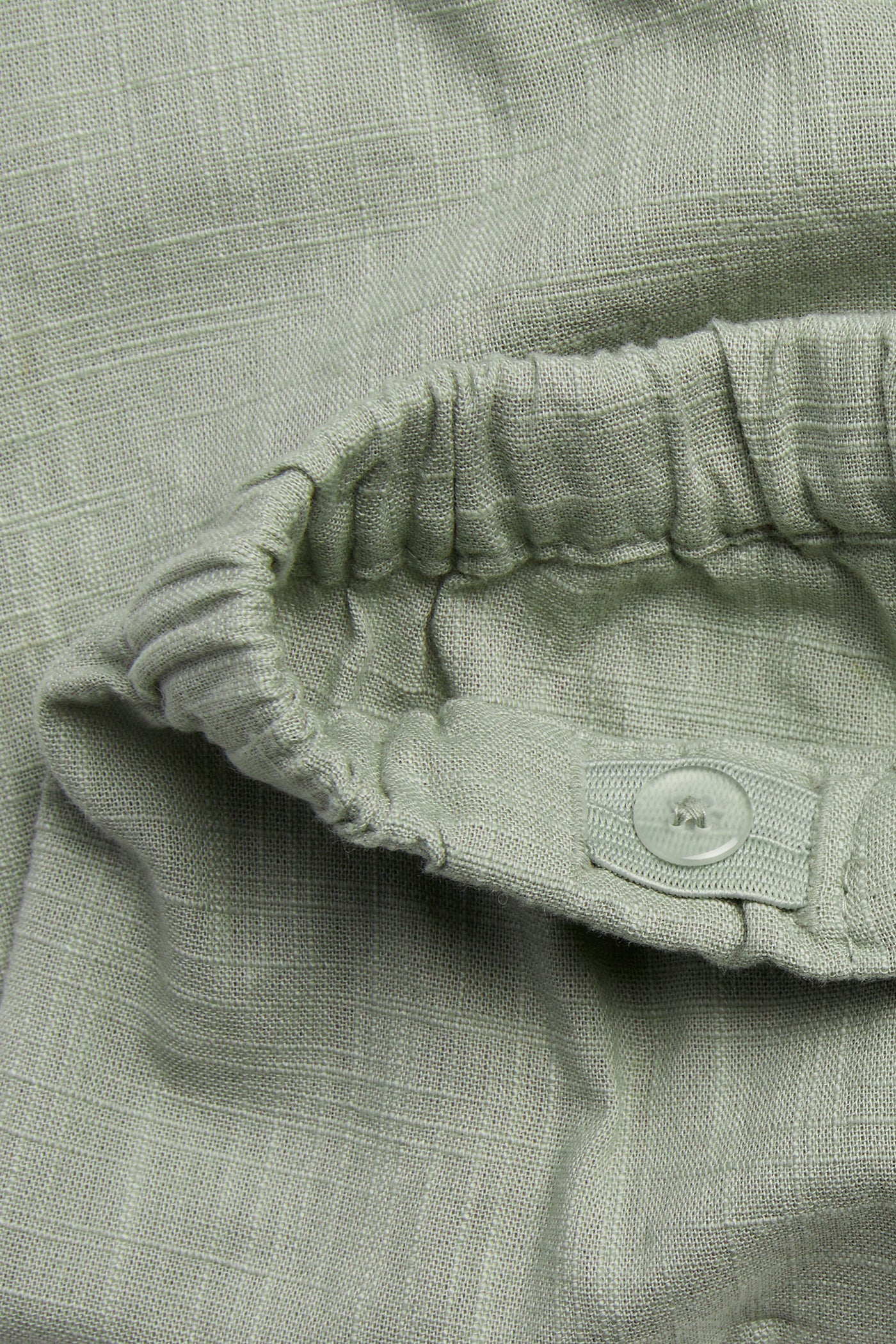 Baby green textured woven trousers