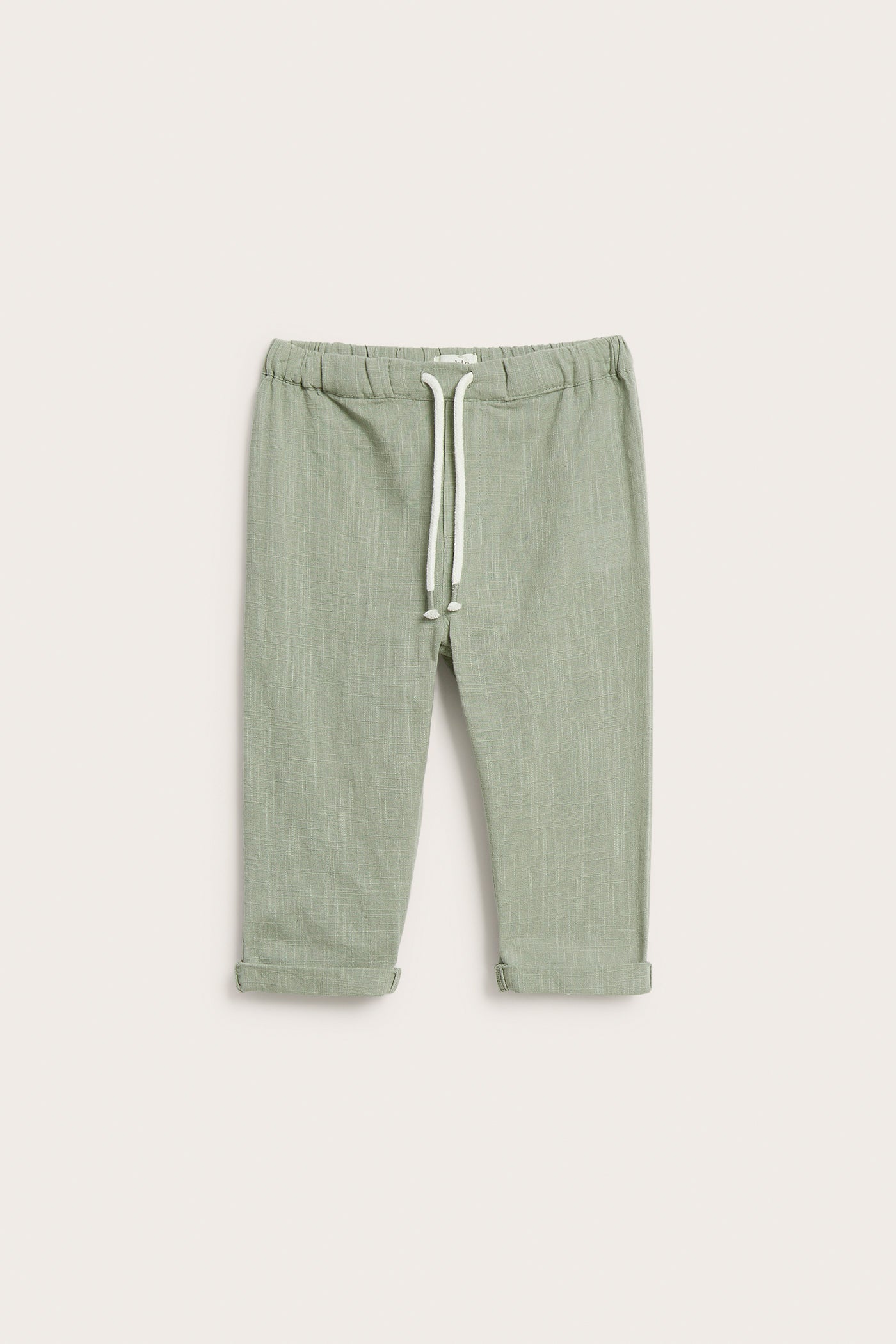 Baby green textured woven trousers