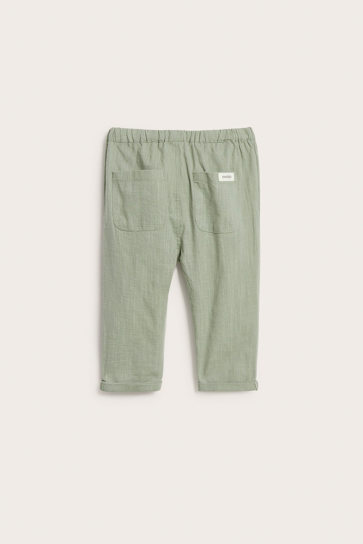 Baby green textured woven trousers