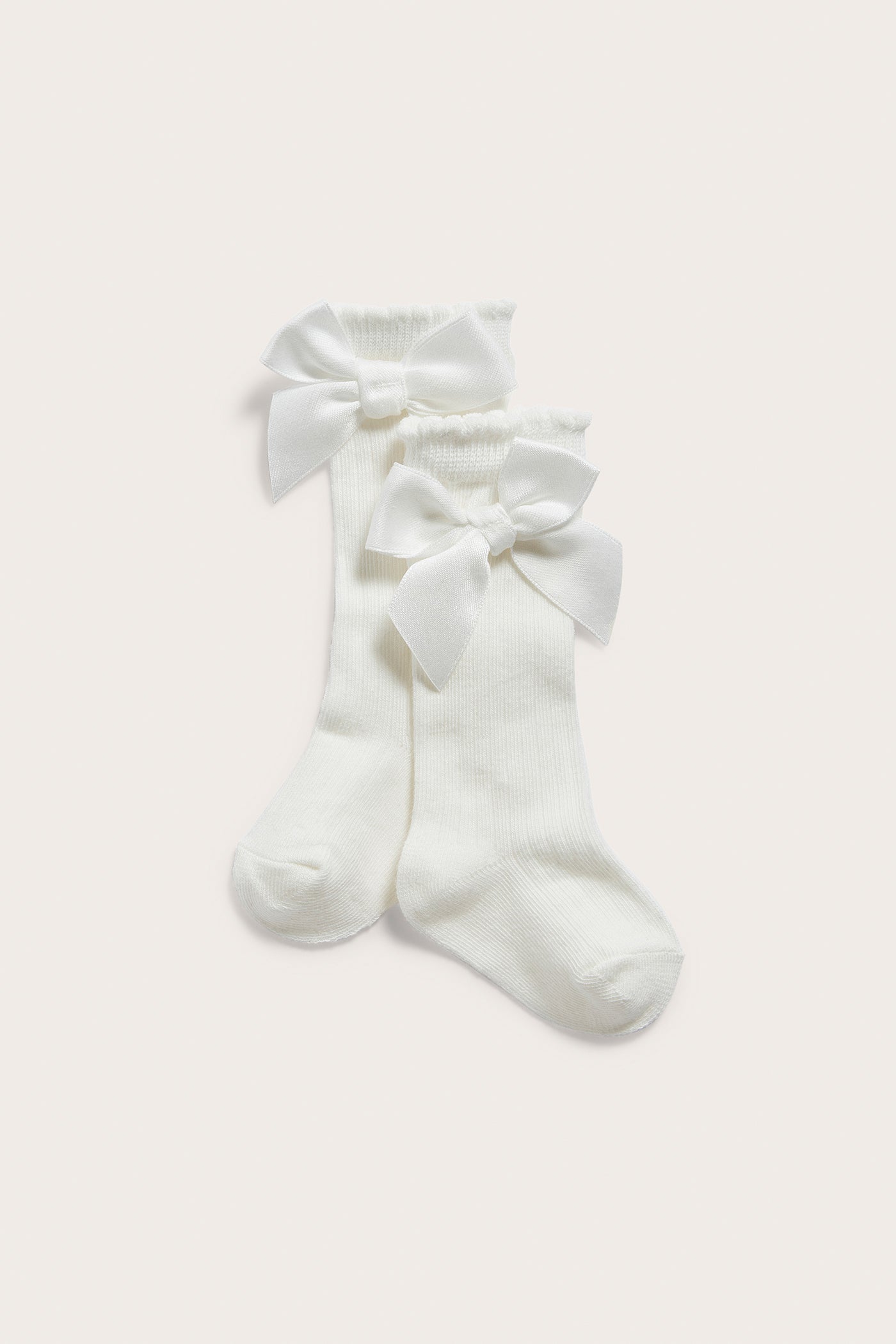 Baby white knee-high bow socks