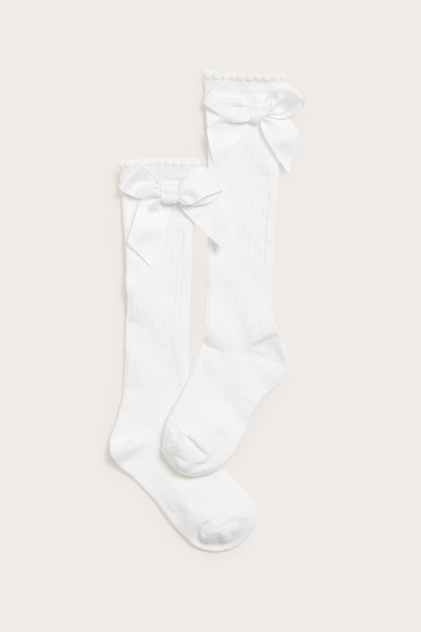 Kids white knee-high bow socks
