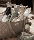 Beige quilted doll basket