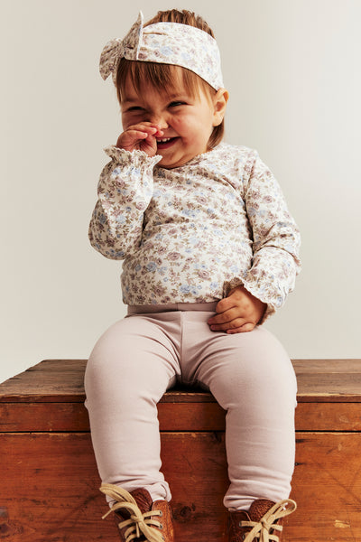 Baby white floral bodysuit with frill