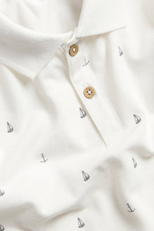 Kids short-sleeved polo shirt with sailboats
