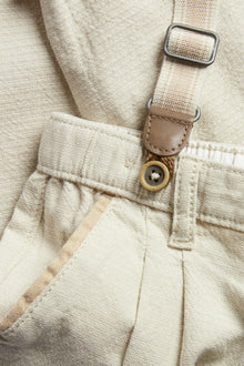 Baby beige woven trousers with suspenders
