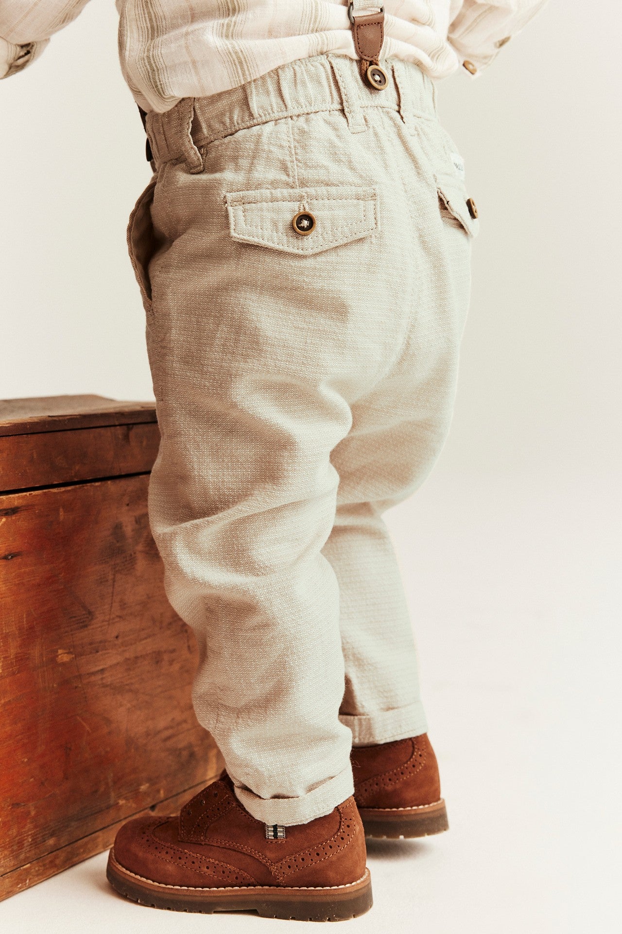 Baby beige woven trousers with suspenders